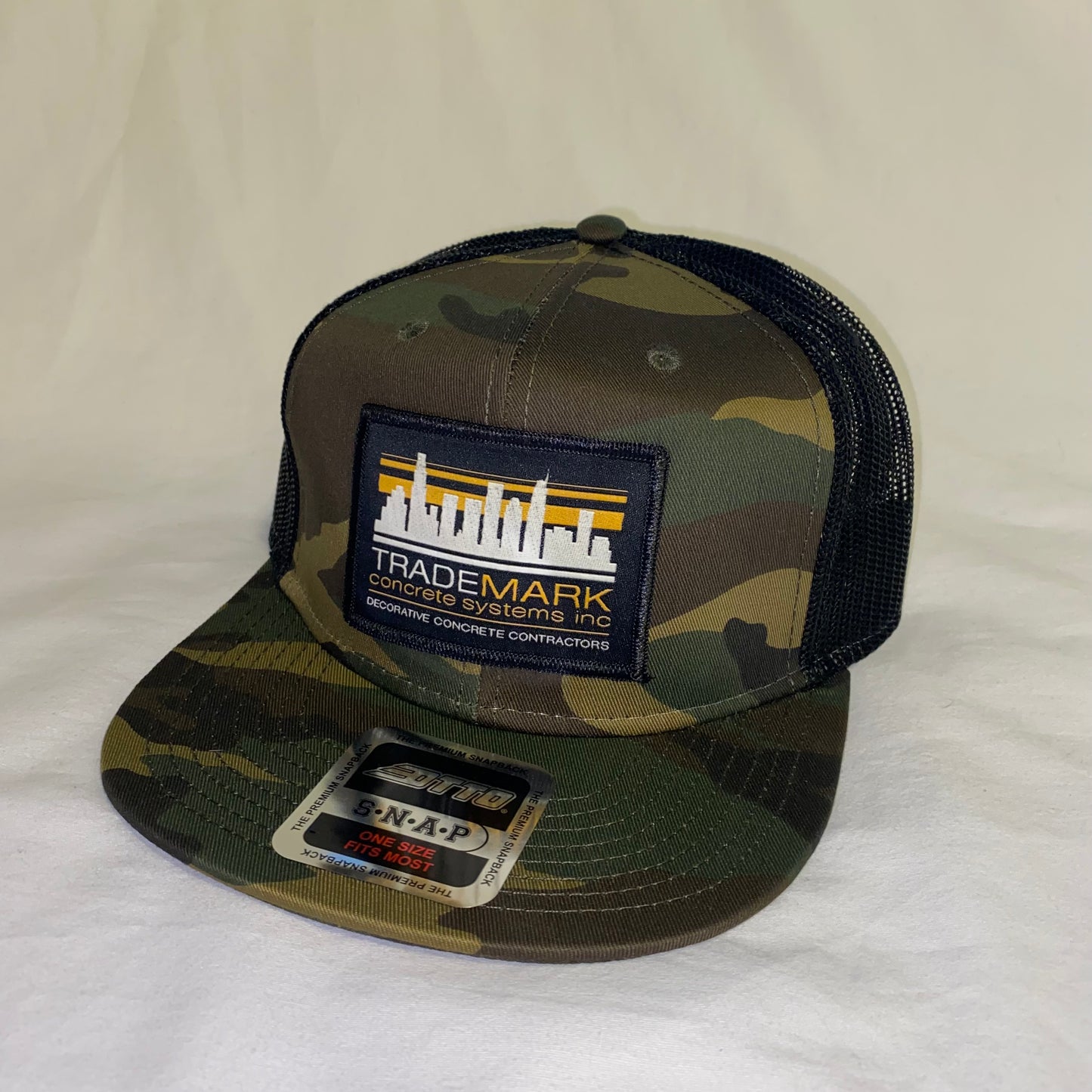 TRADEMARK CAMO TRUCKER HAT